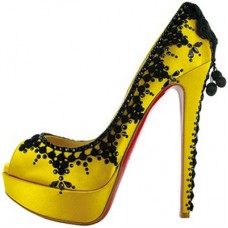 Décolleté Christian Louboutin Torero 140mm con punta aperta, colore limone Décolleté Christian Louboutin Torero 140mm con punta aperta, colore limone